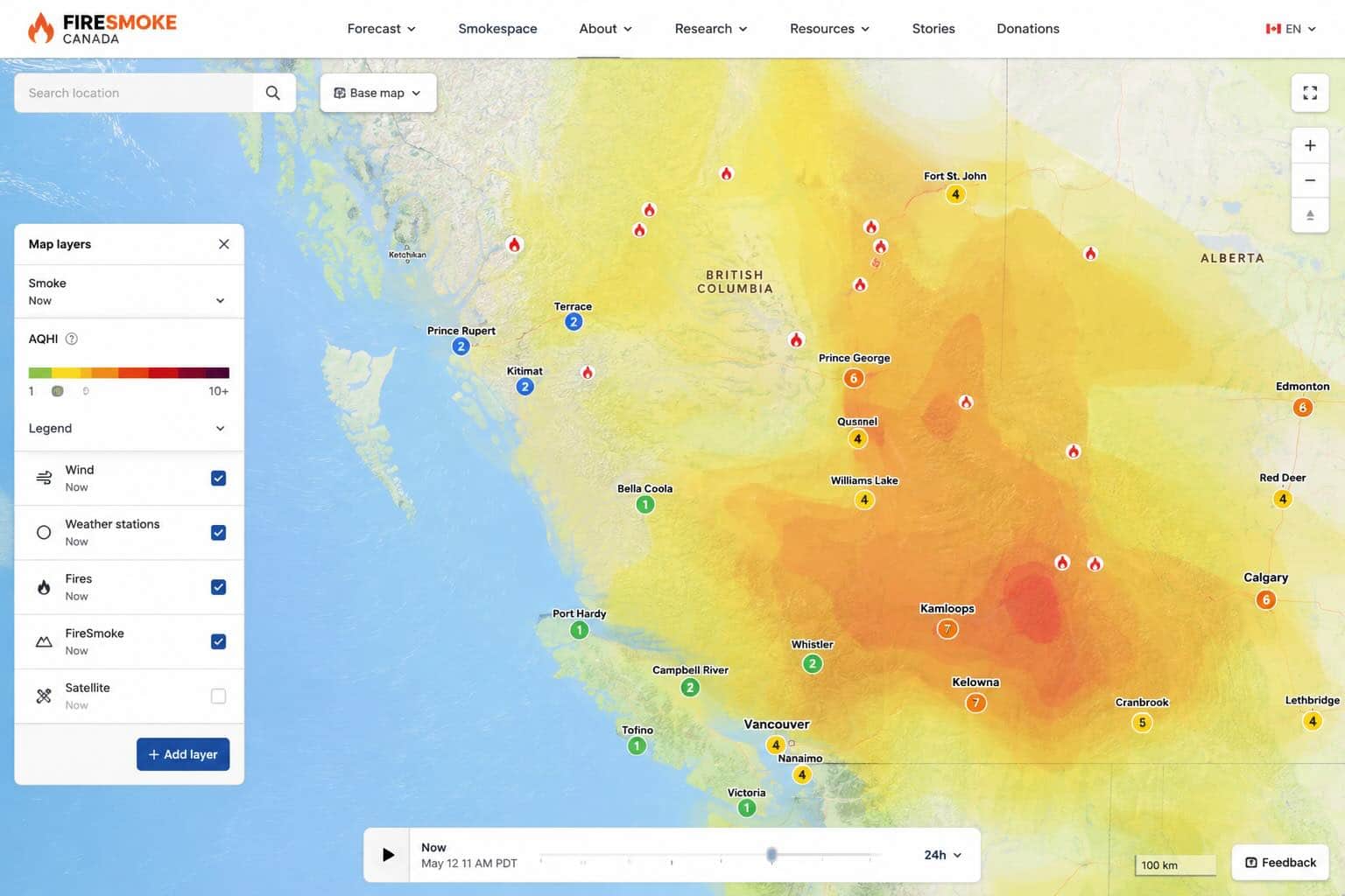 Checking the BC wildfire smoke forecast map and air quality index on a smartphone