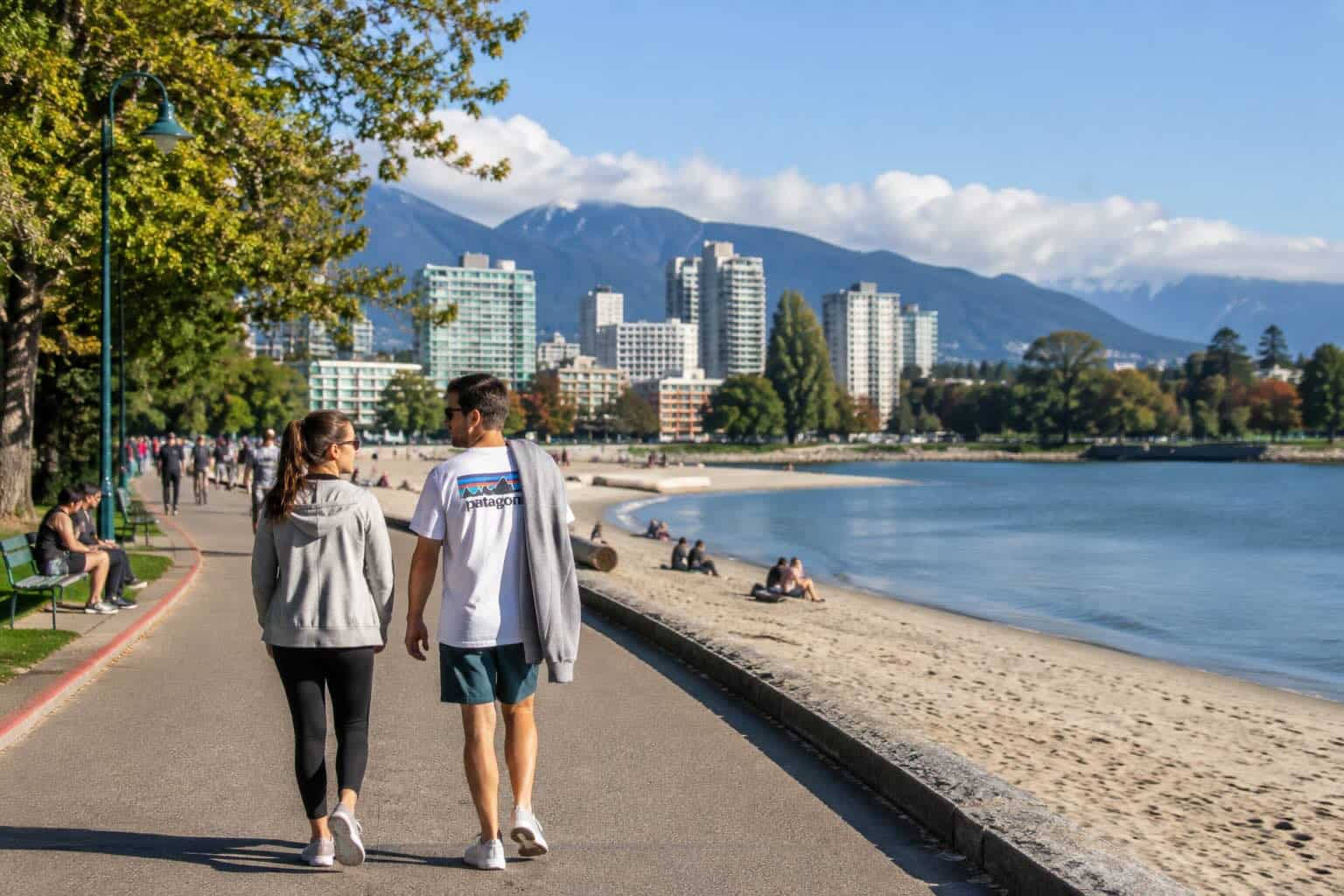 People enjoying the crisp air and golden sunshine during the vancouver weather september 2026 season.
